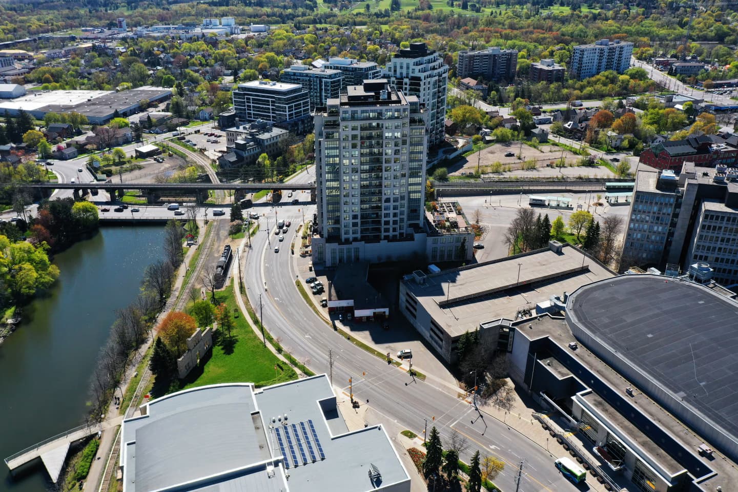 Aerial view of downtown Guelph, Ontario, showing buildings, roads, and the river.