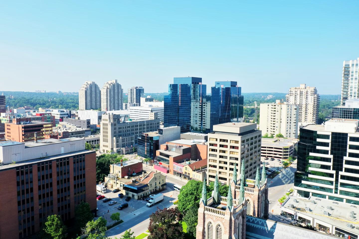 Aerial view of downtown London, Ontario, featuring modern buildings and historic architecture.